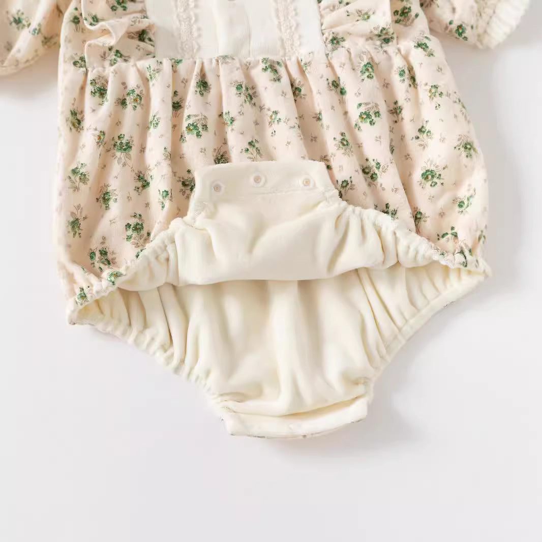 Barboteuse fleurie à manches longues pour bébé fille